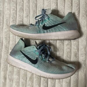 Nike Women's Light Teal Knit Running Shoes